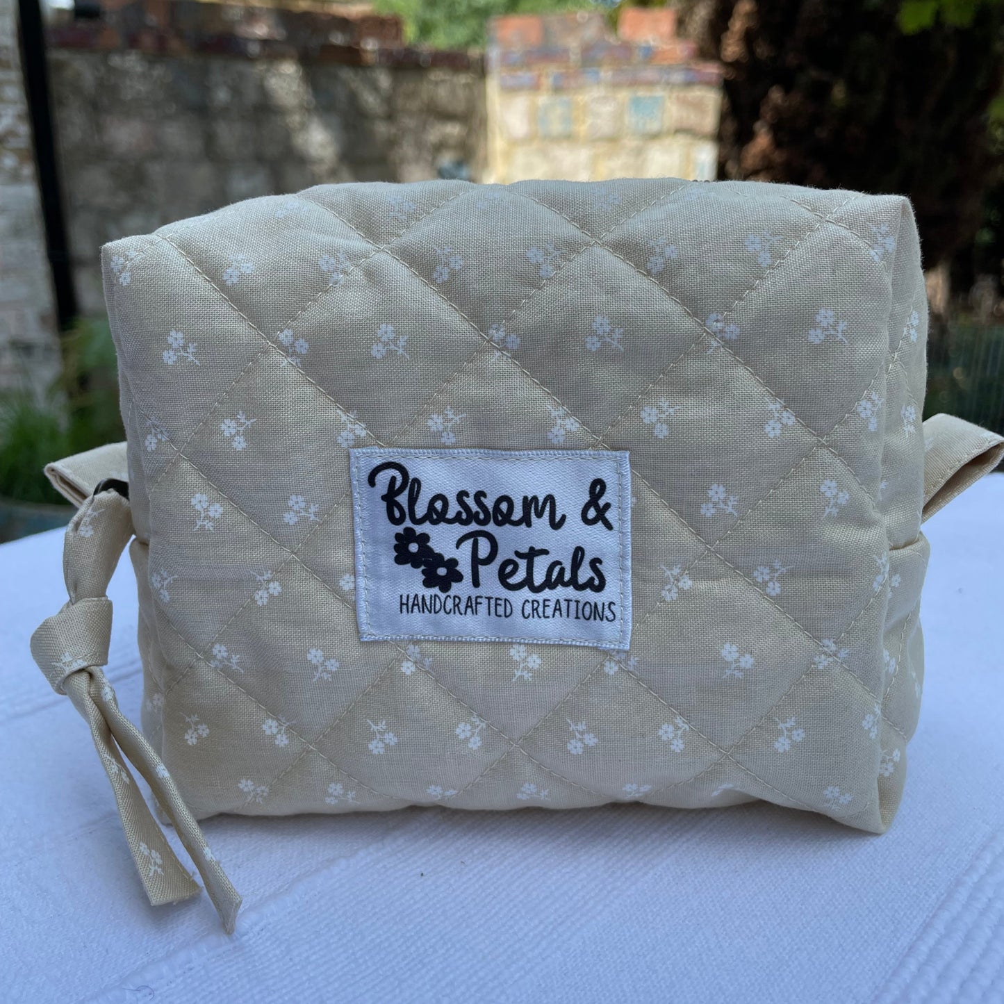 Beige Floral Quilted Pouch Bag