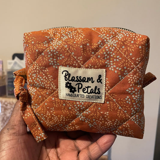 Handmade Quilted Makeup Pouch – Burnt Orange Leaf Print Bag