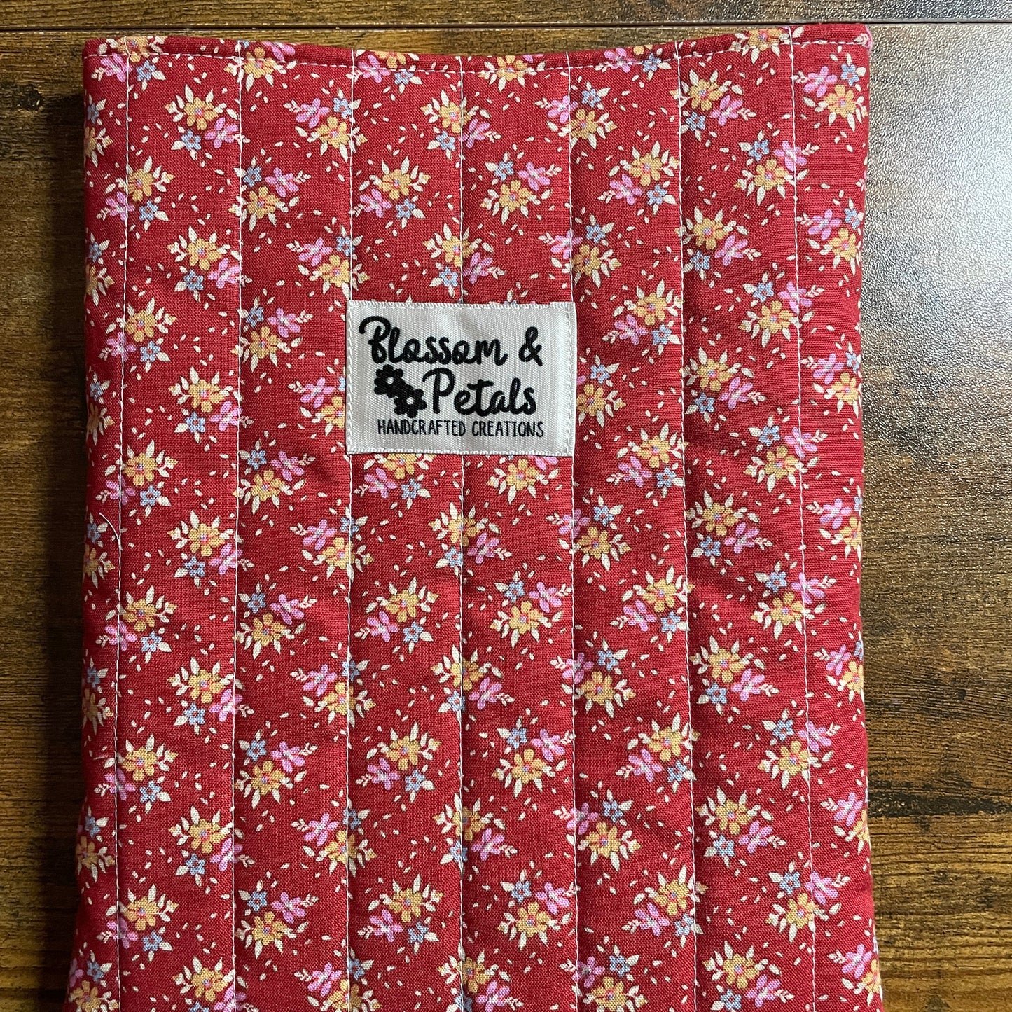 Handmade red floral padded fabric book sleeve for book protection